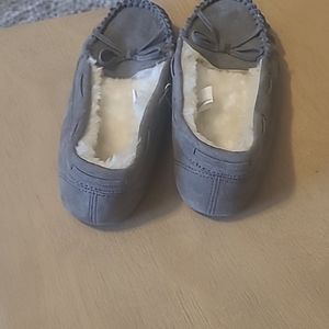 Gray little boy slide in